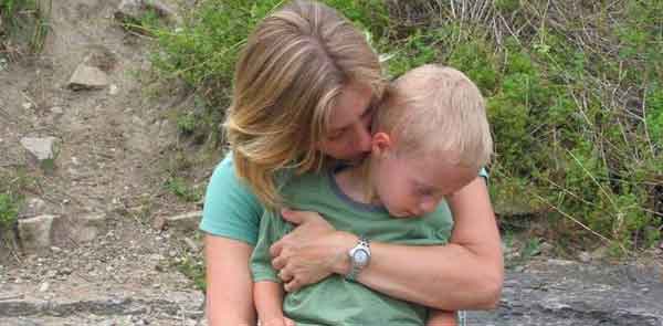 A mother holding her child