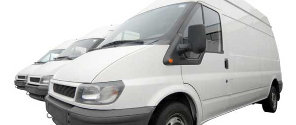 A row of white vans